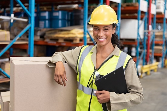 woman in warehouse with packaged products