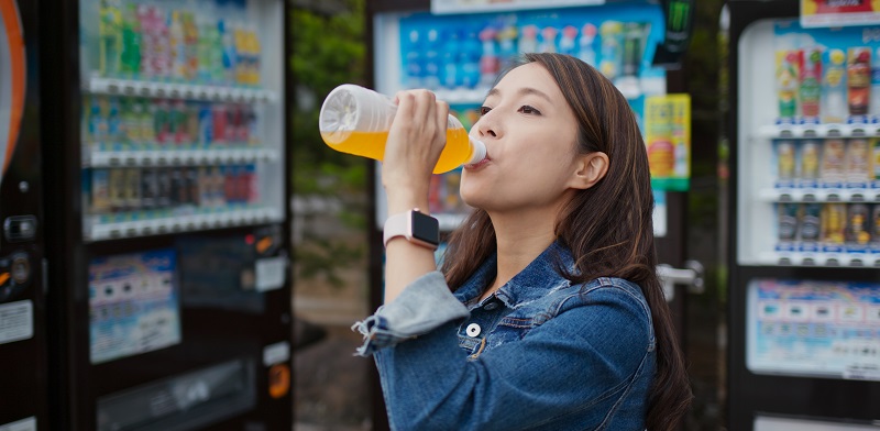 Girl Drinking A Vending Machine product