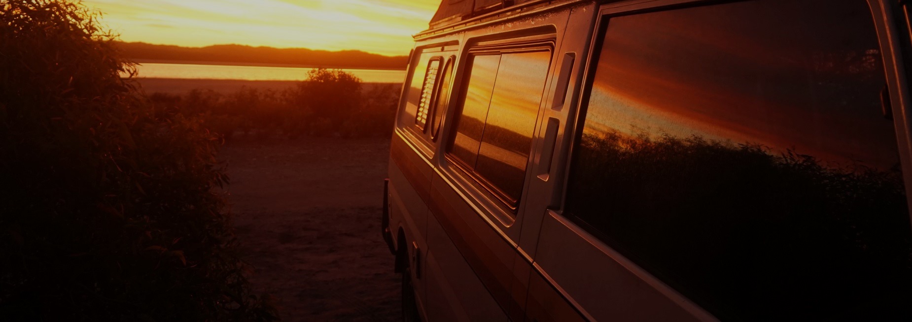 Campervan in a sunset